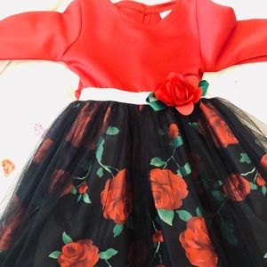 Beautiful red and black Christmas dress. Size 4T. Only worn once.